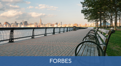 Forbes tile image with the Jersey side view of NYC.